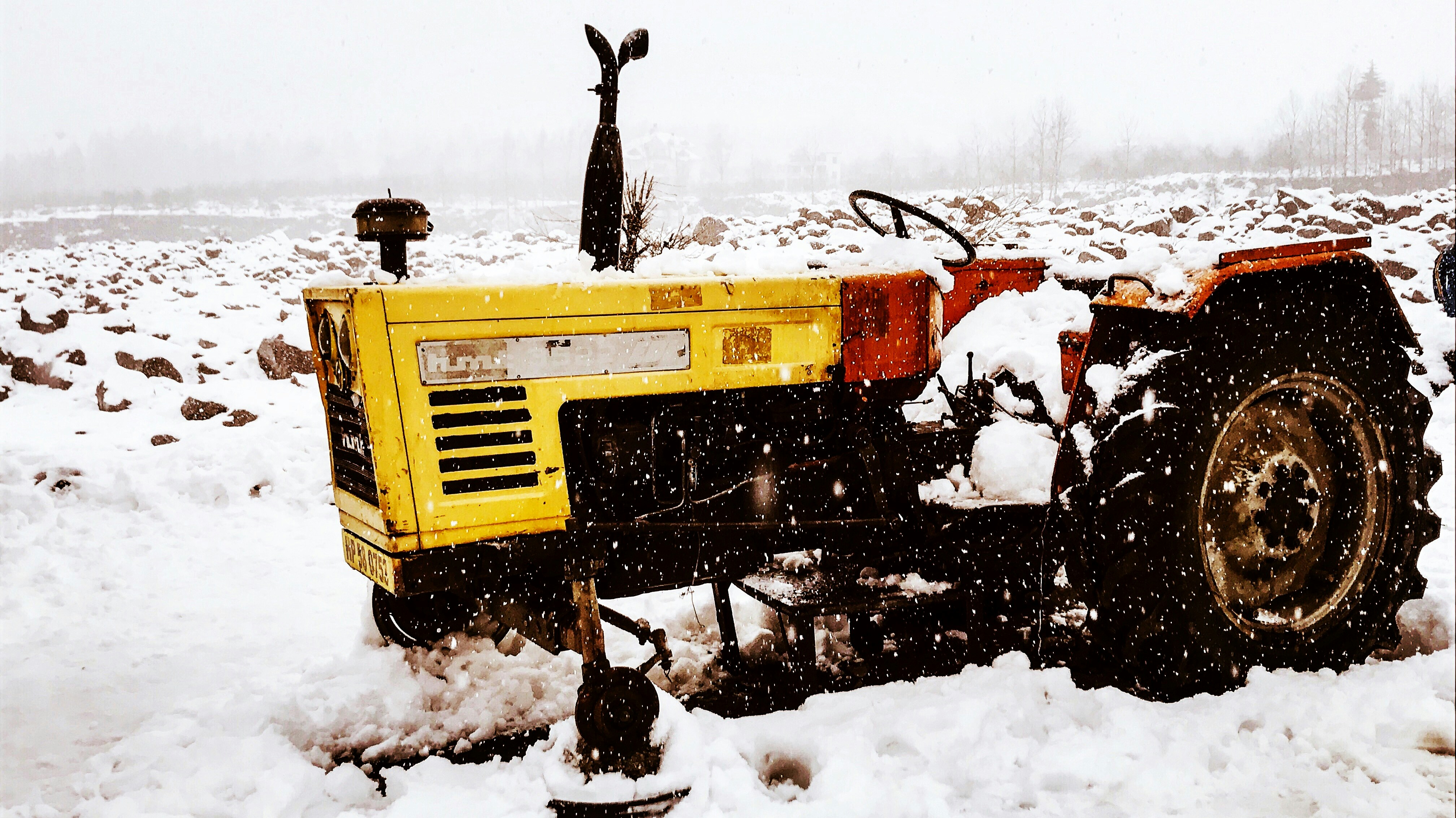 heavy equipment operating in challenging Midwest weather - site preparation Midwest