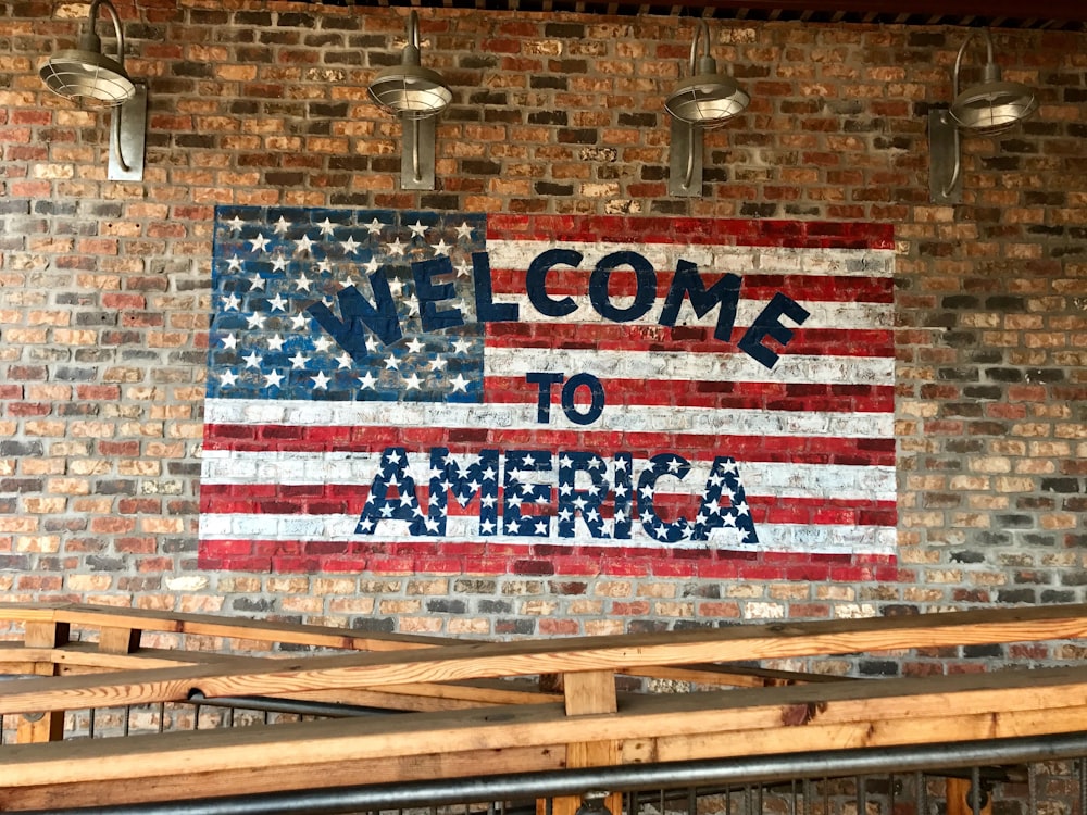 us a flag on brown brick wall