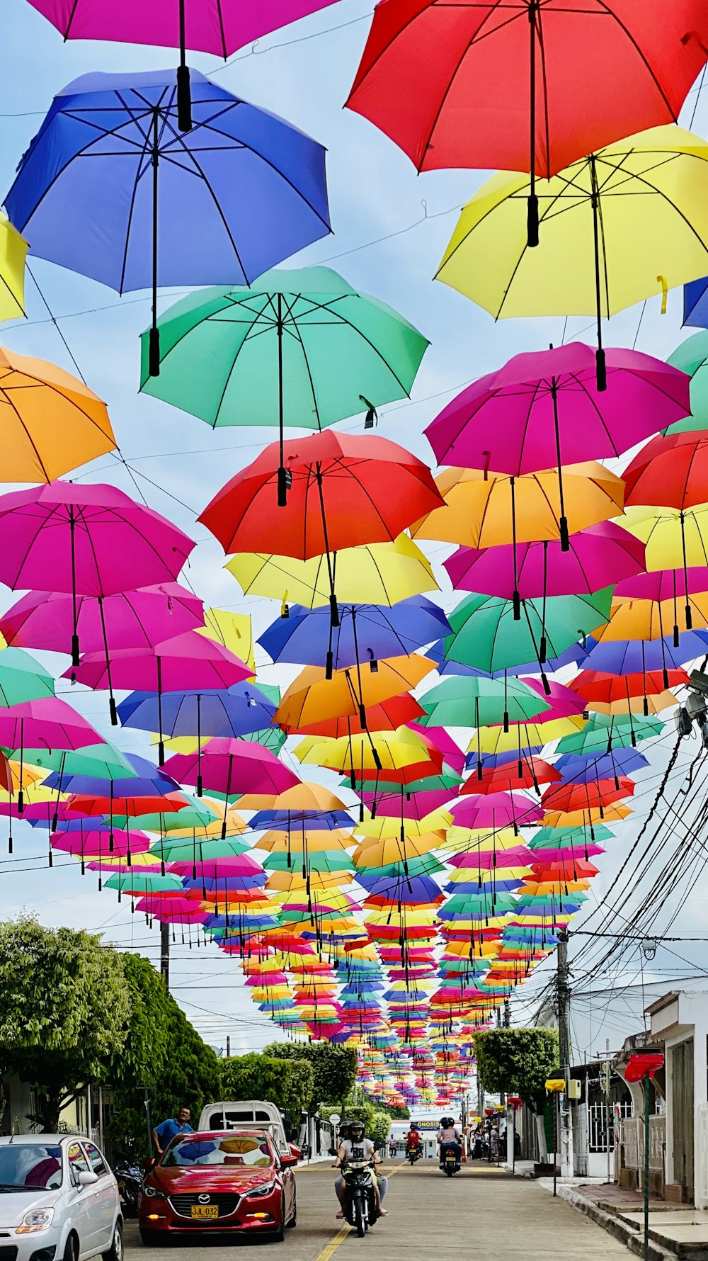 lote multicolorido do guarda-chuva do guarda-chuva