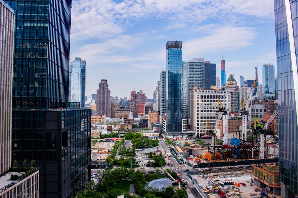 city buildings under blue sky during daytime