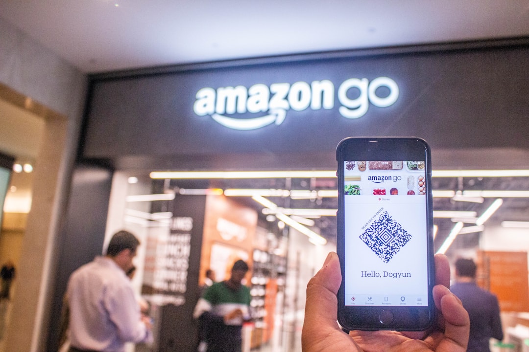 person holding black samsung android smartphone, Amazon Go