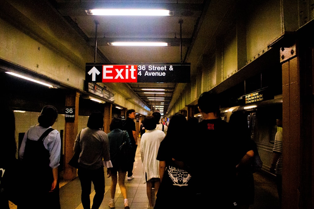 people walking on hallway during nighttime