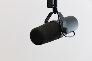 black microphone on white background