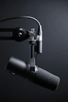 black and silver microphone with stand