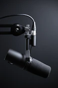 black and silver microphone with stand