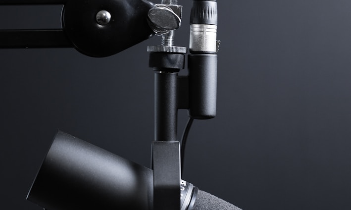black and silver microphone with stand