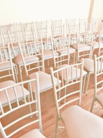 An empty courtroom with chairs arranged for a hearing.