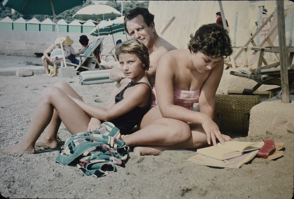 2 women sitting on beach chairs