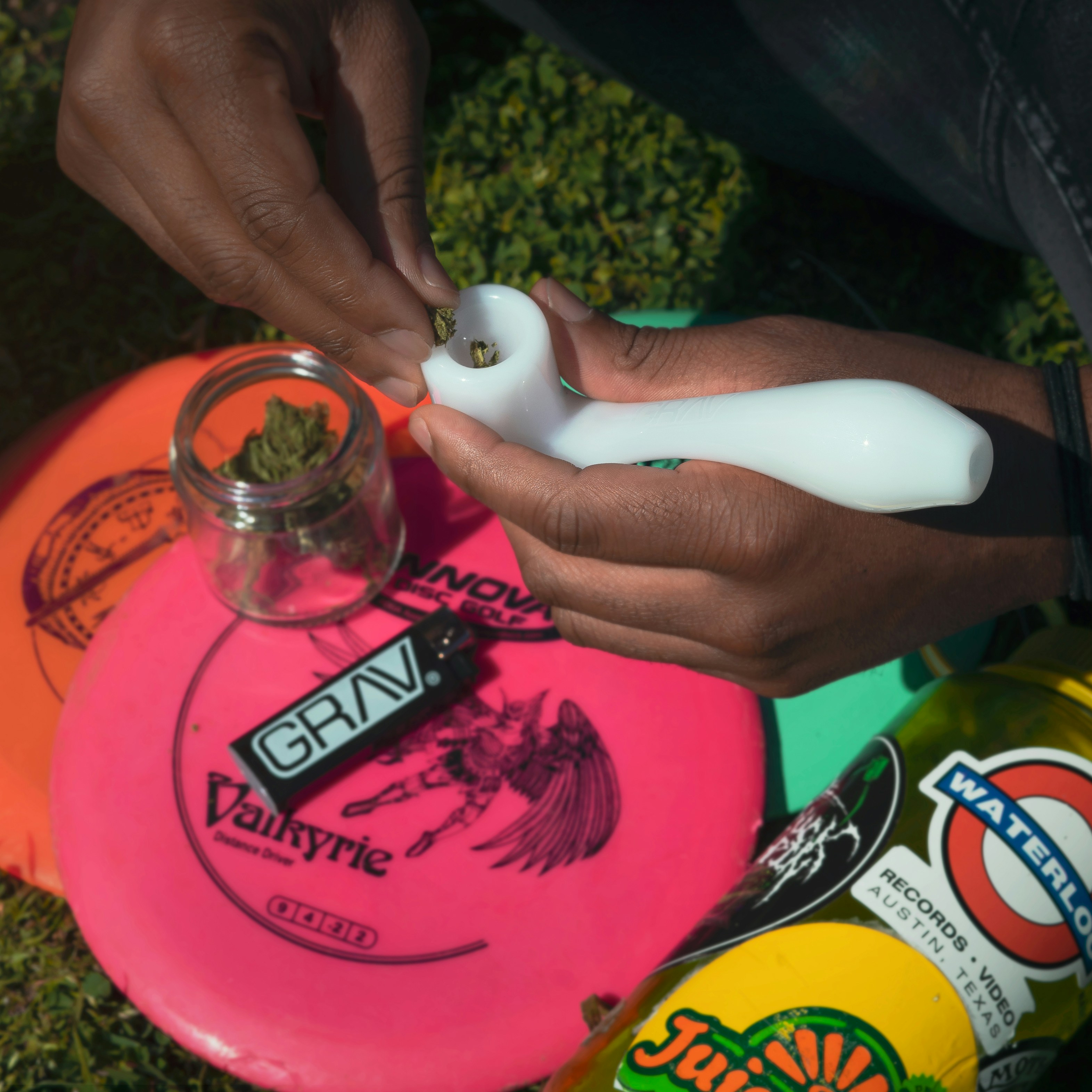 person holding white plastic bottle