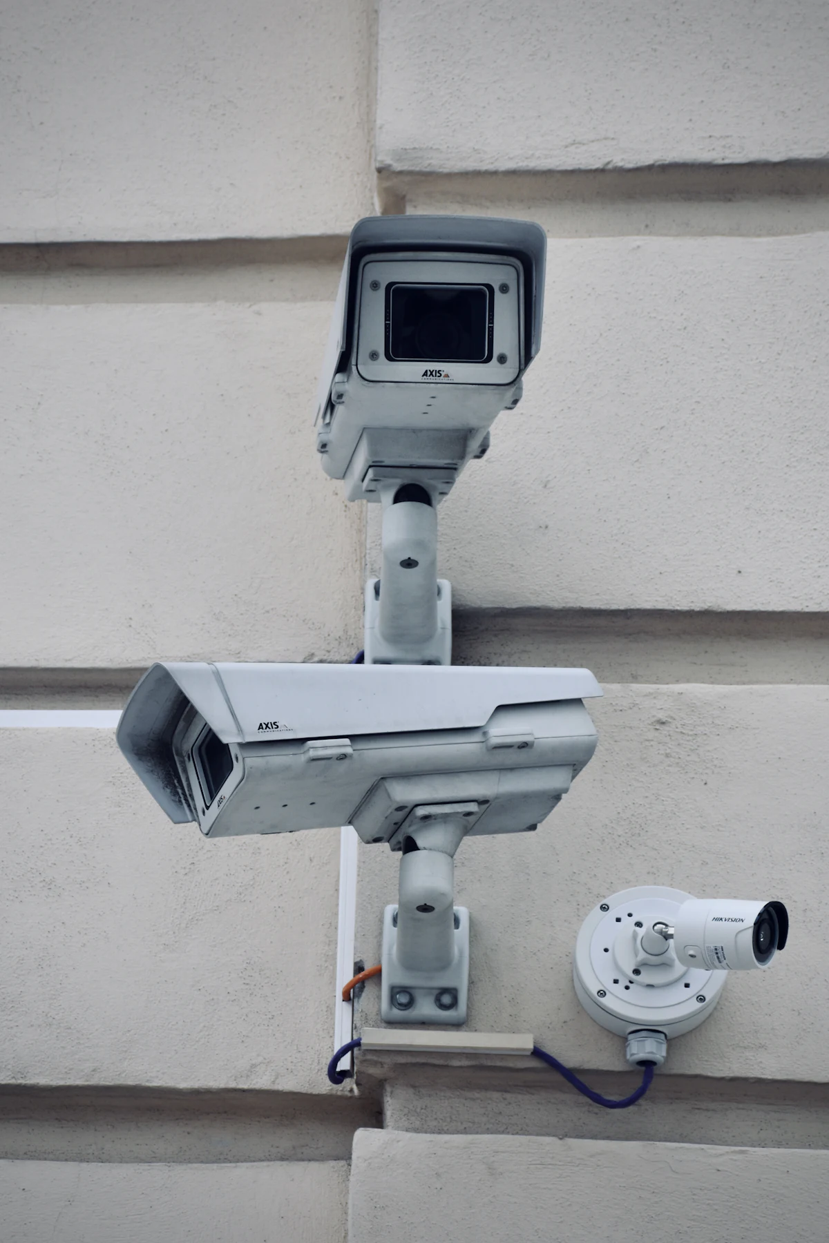 Box-body camera on a bracket covering an office entrance