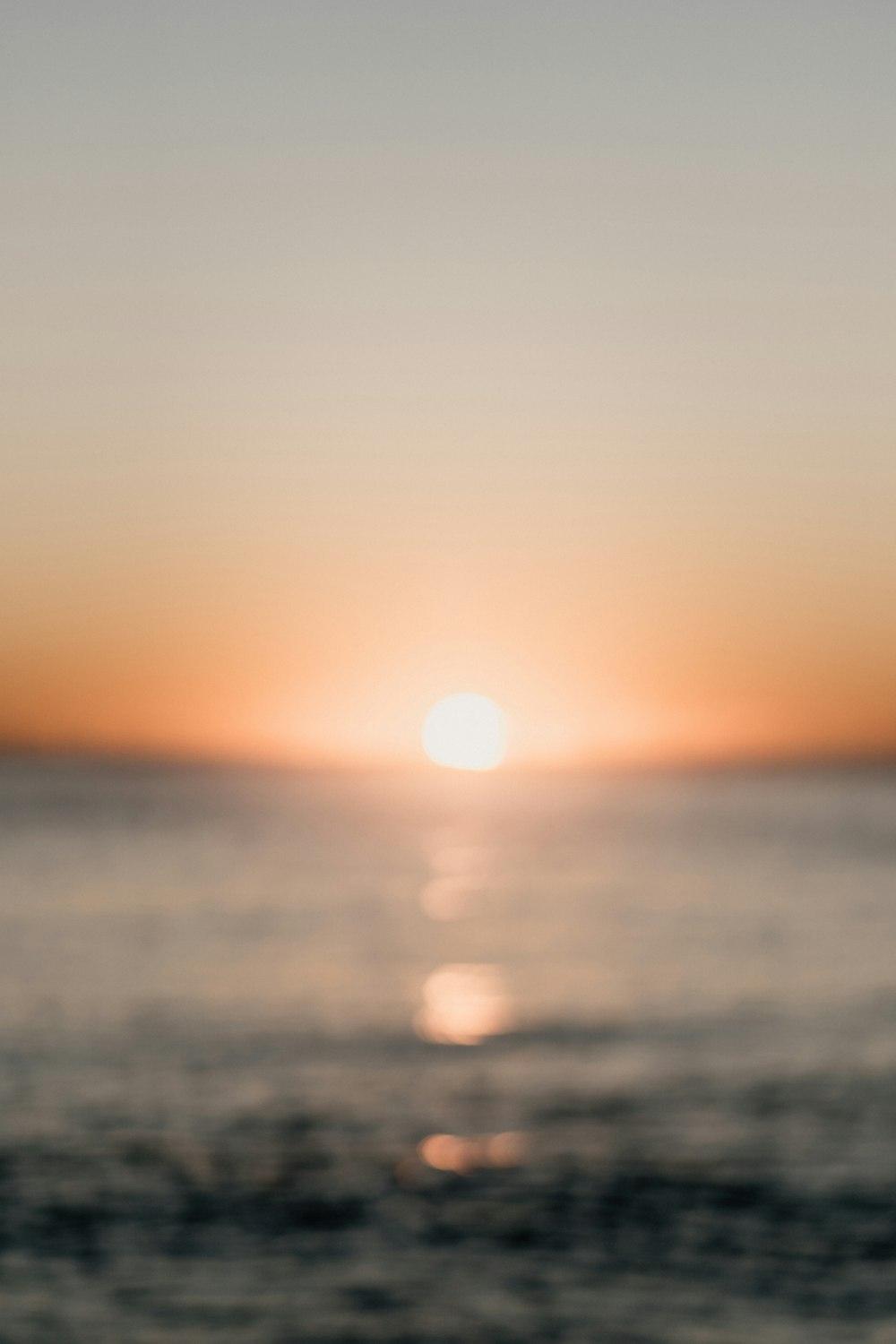 body of water during sunset