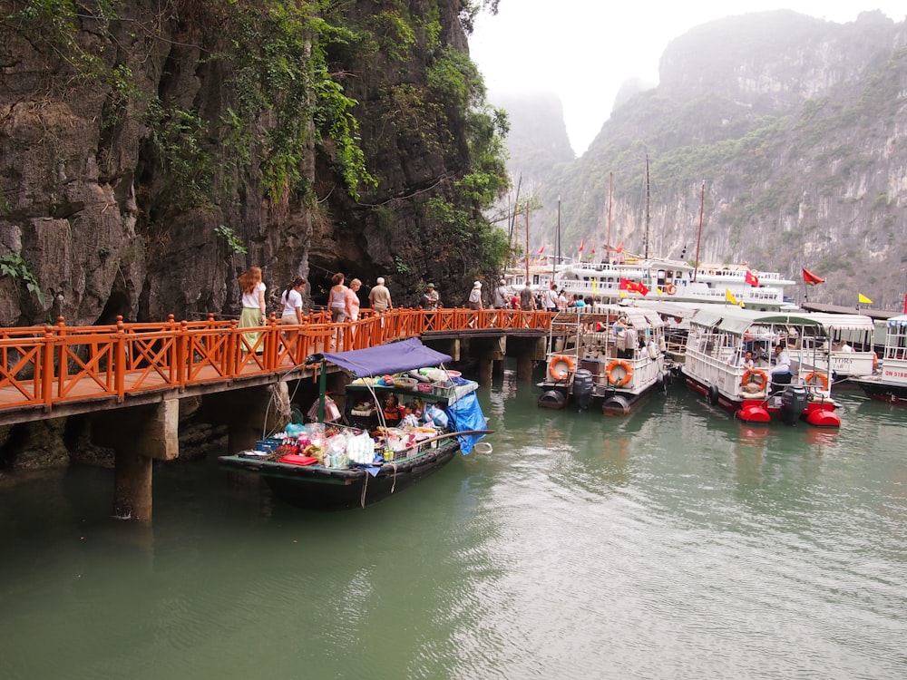 people riding on boat on river during daytime