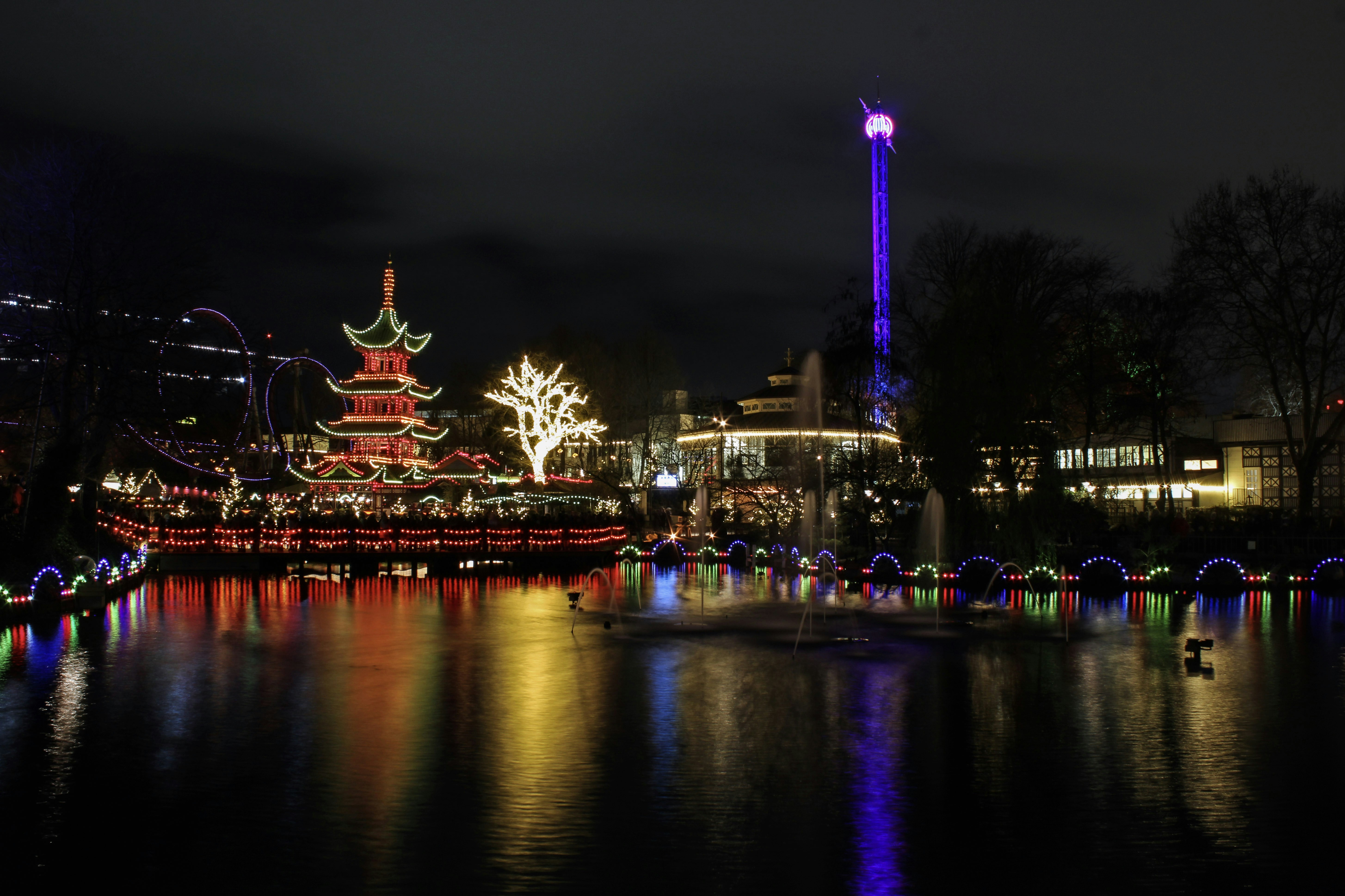 lights at Tivoli Gardens at night time, refleting into the water