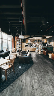 brown wooden chairs and tables