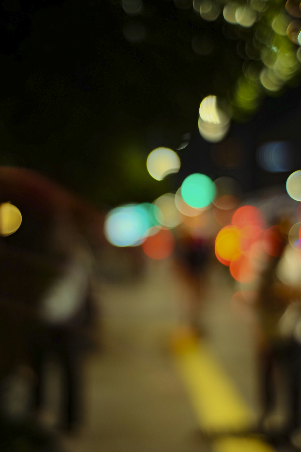 Bokeh photography of people walking on street during night time ...