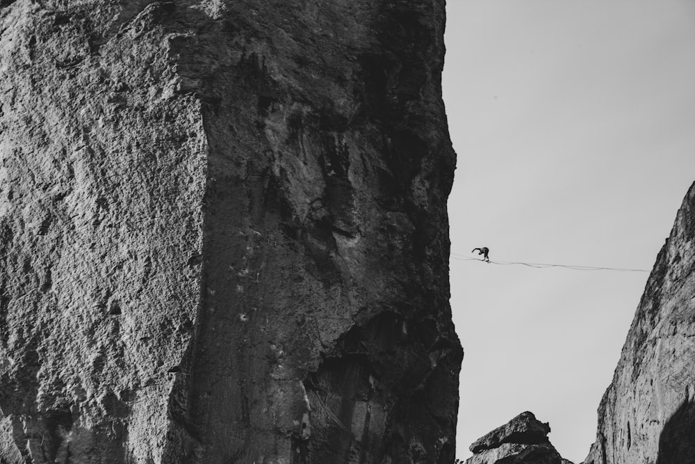 grayscale photo of rock formation