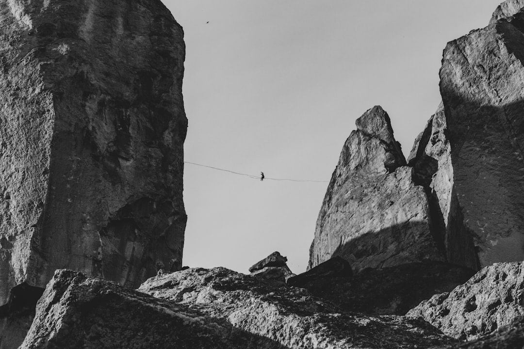 grayscale photo of rocky mountain