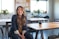 woman in black blazer sitting on chair