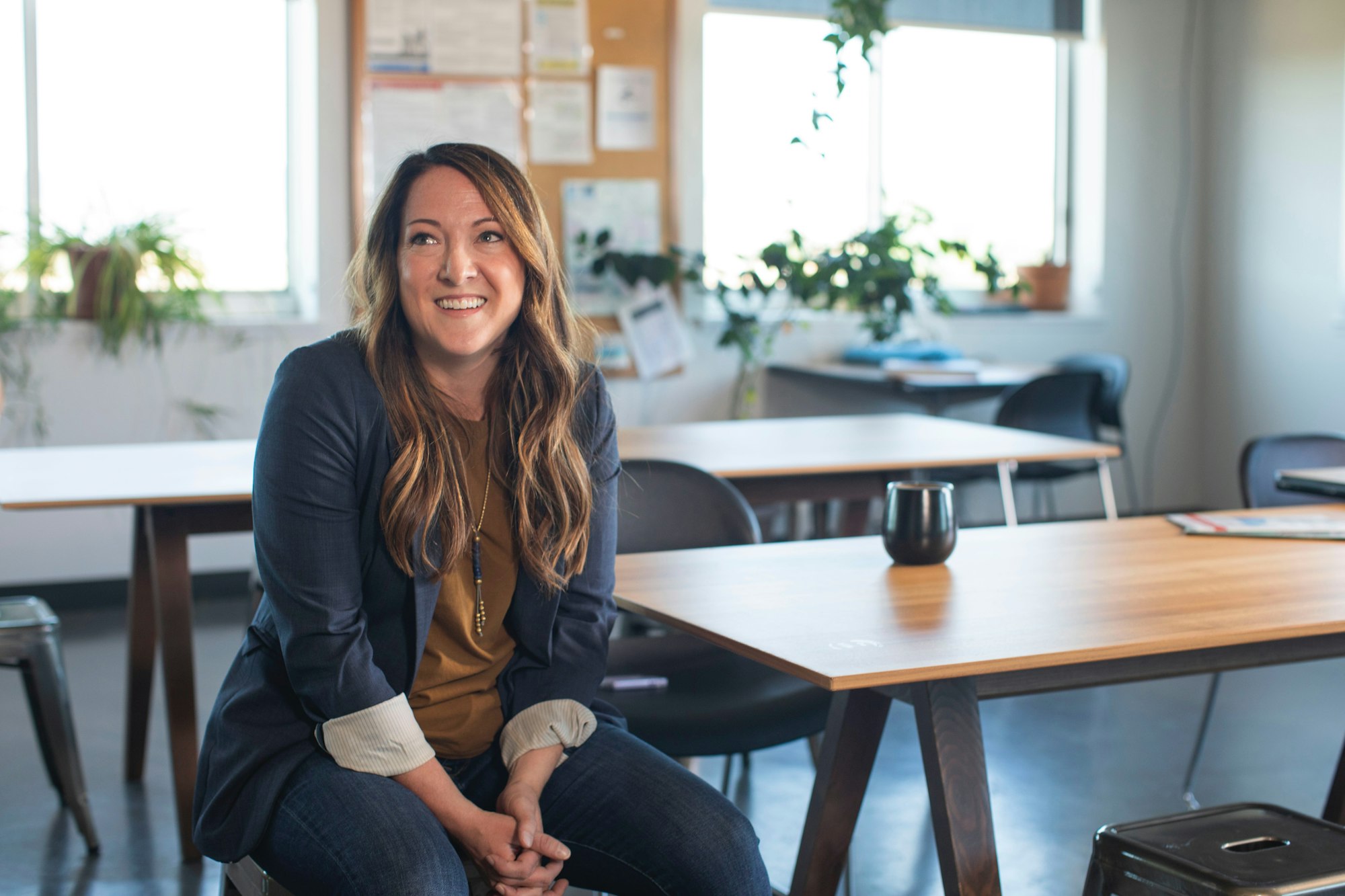 Sales woman sitting in cafe coffee shop