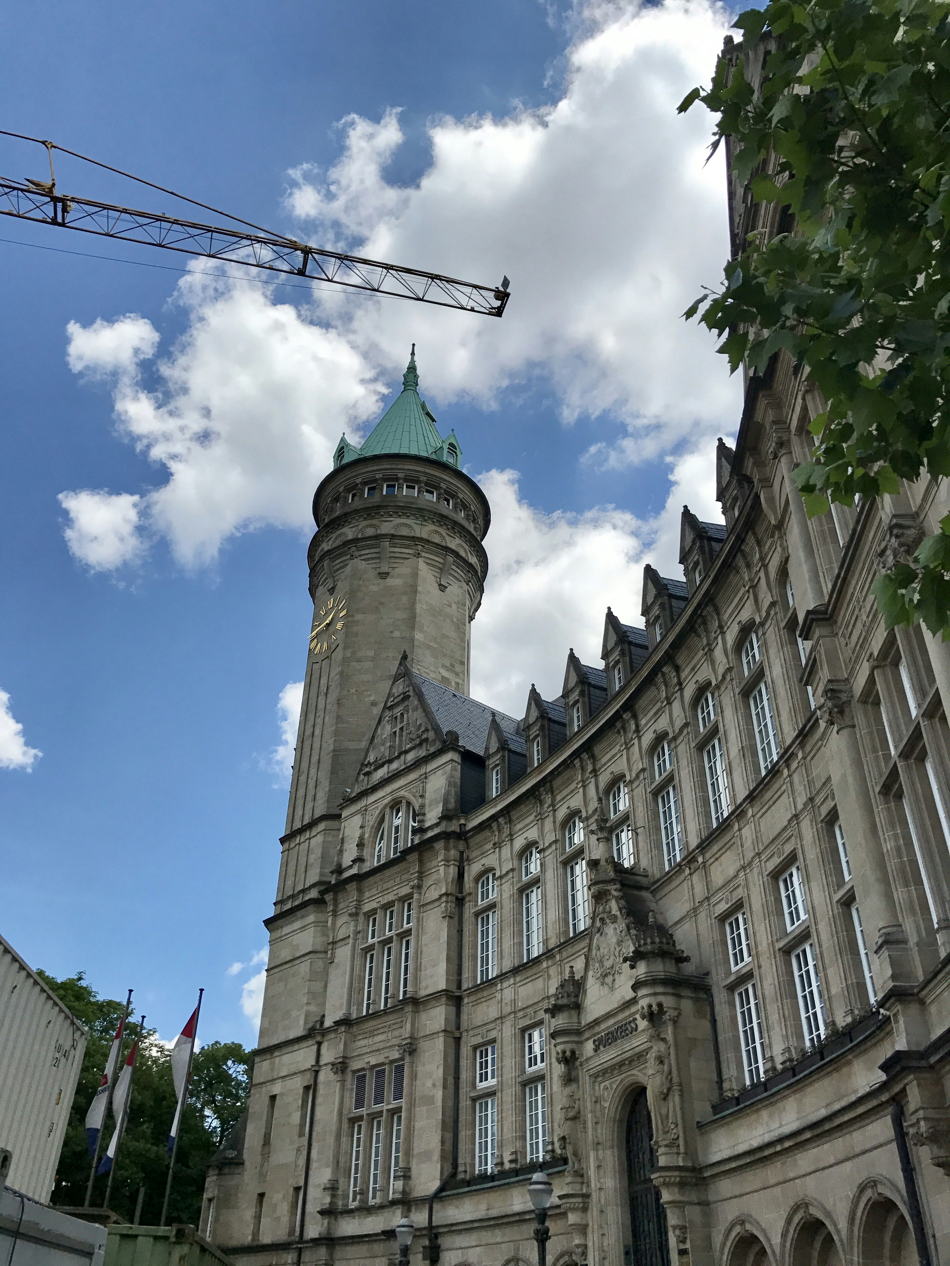 brown concrete building under blue sky during daytime