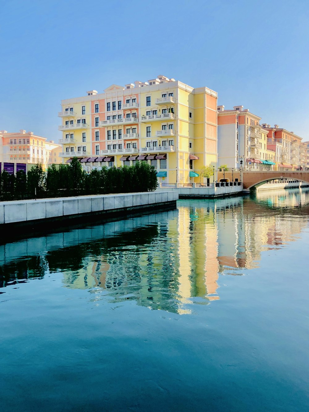 body of water near buildings during daytime
