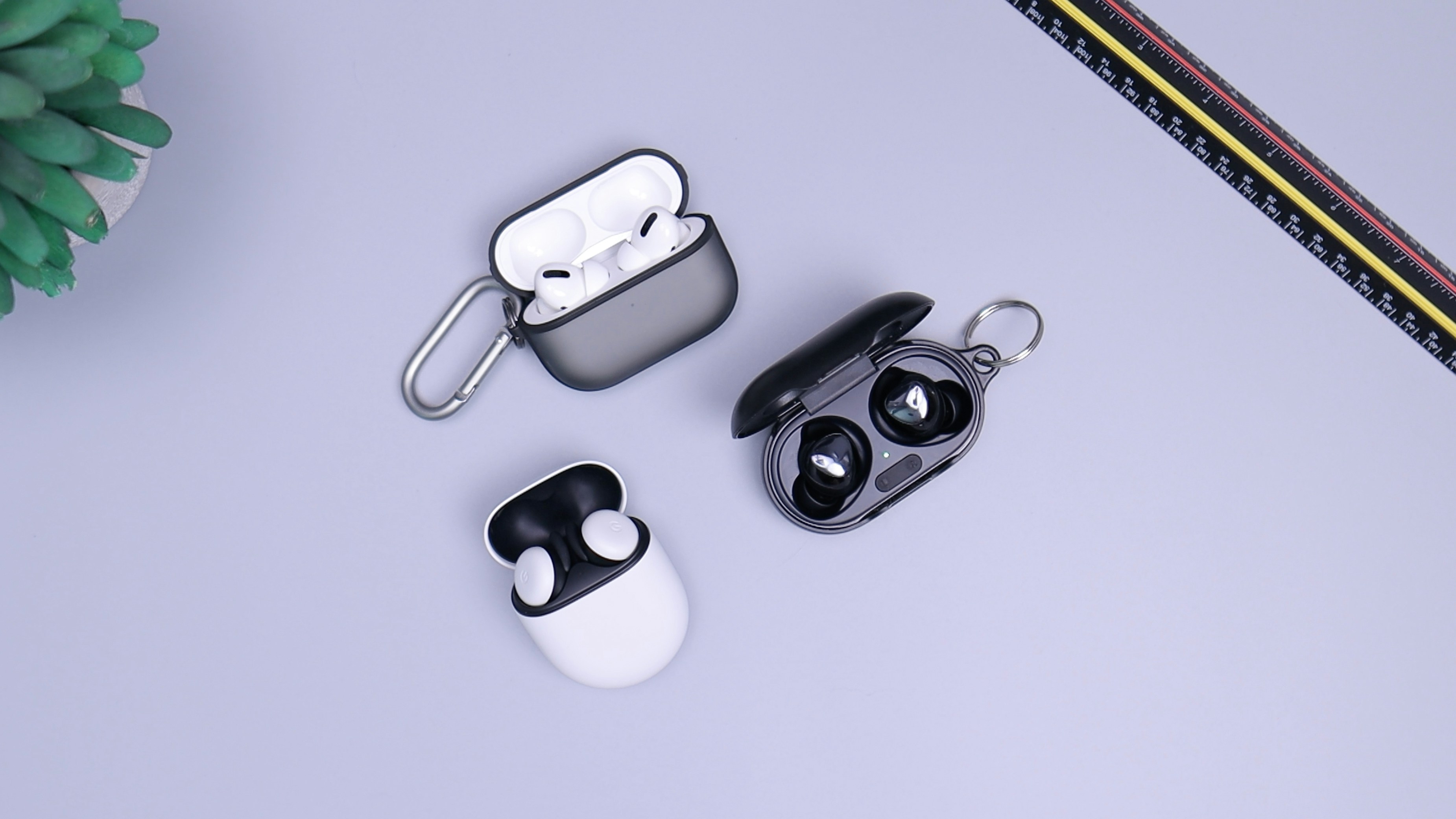 AirPods Pro, Pixel Buds, and Buds+ on Desk