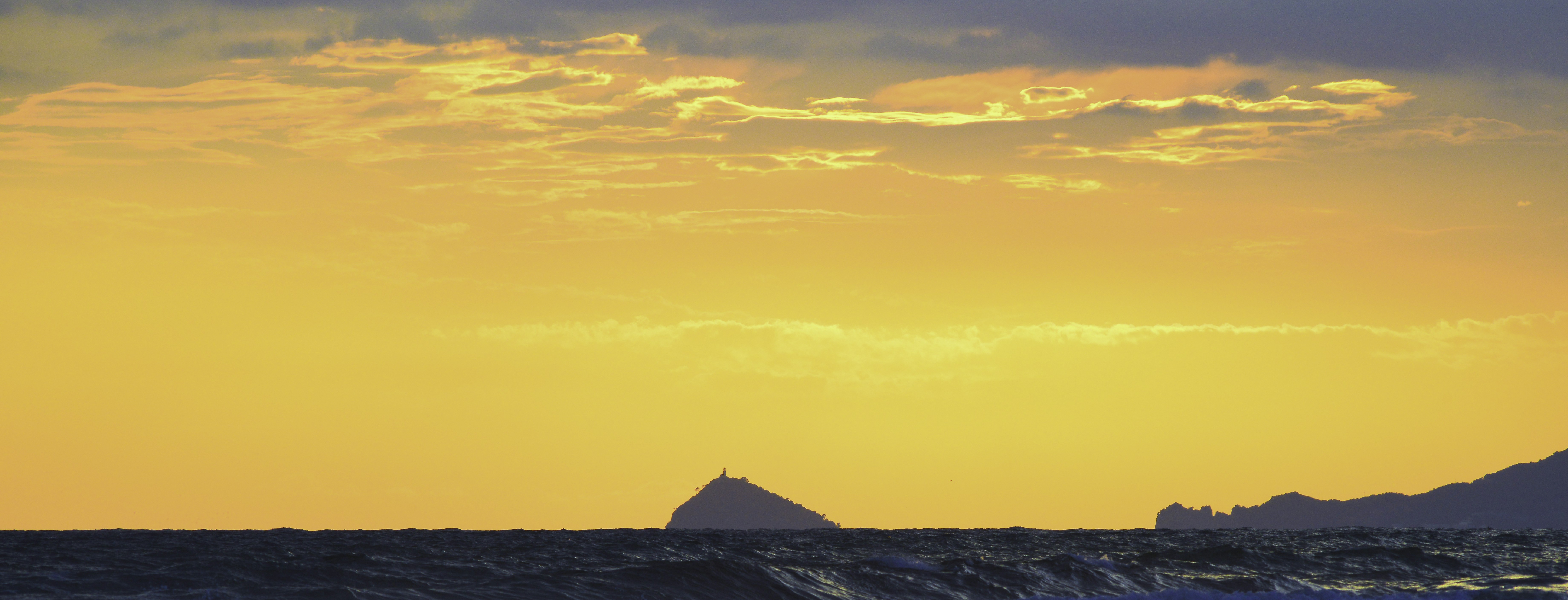 silhouette of mountain during sunset