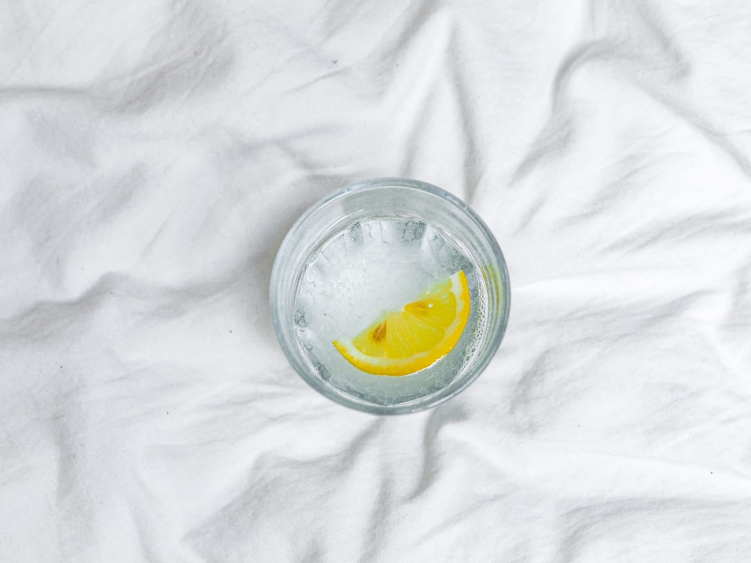 yellow liquid in clear glass round bowl