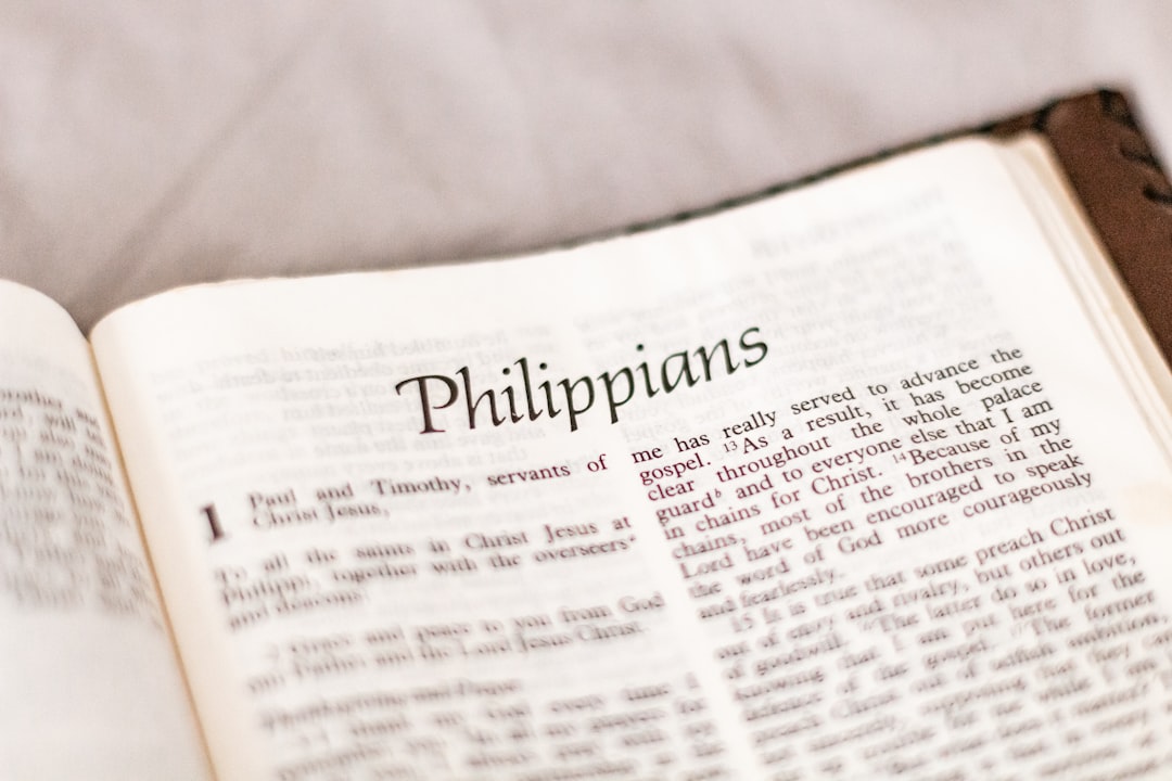 white printer paper on white textile, The Bible book of Philippians