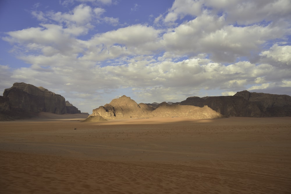 brown sand under blue sky during daytime