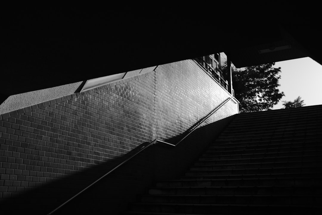 grayscale photo of concrete wall