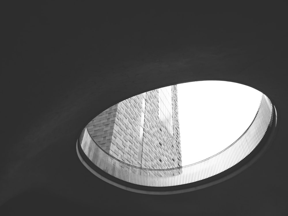 grayscale photo of round building