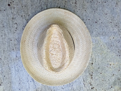A stylish hat featuring a unique hand-stitched design.