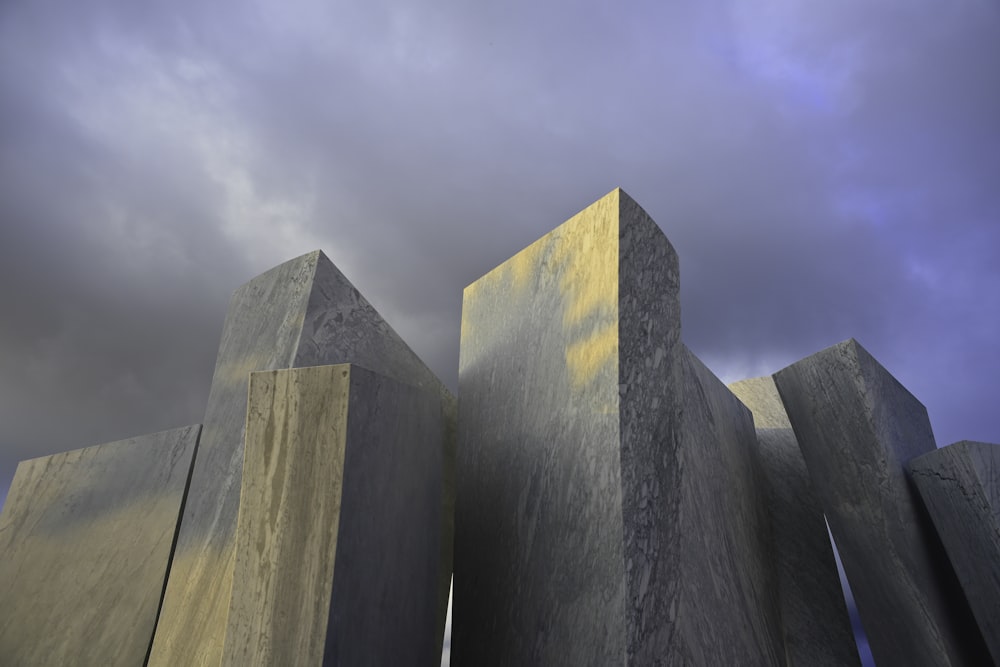 gray concrete wall under blue sky during daytime