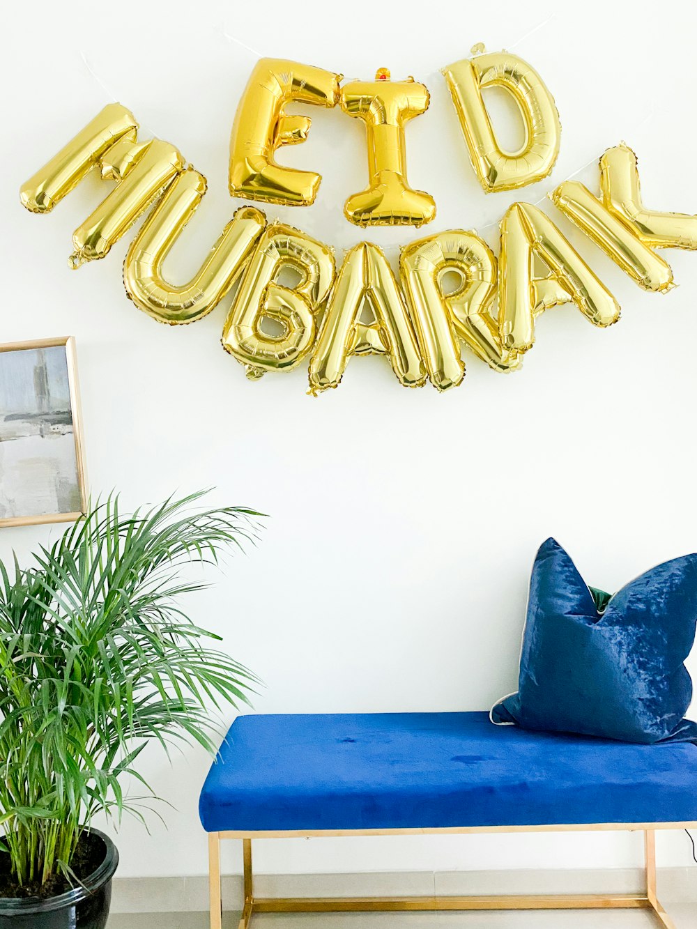 gold dragon figurine on blue couch