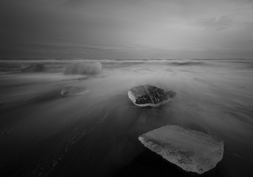 grayscale photo of water waves