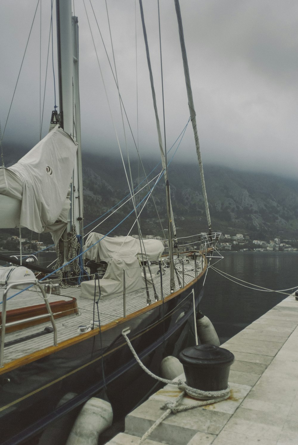 brown and white boat on dock during daytime