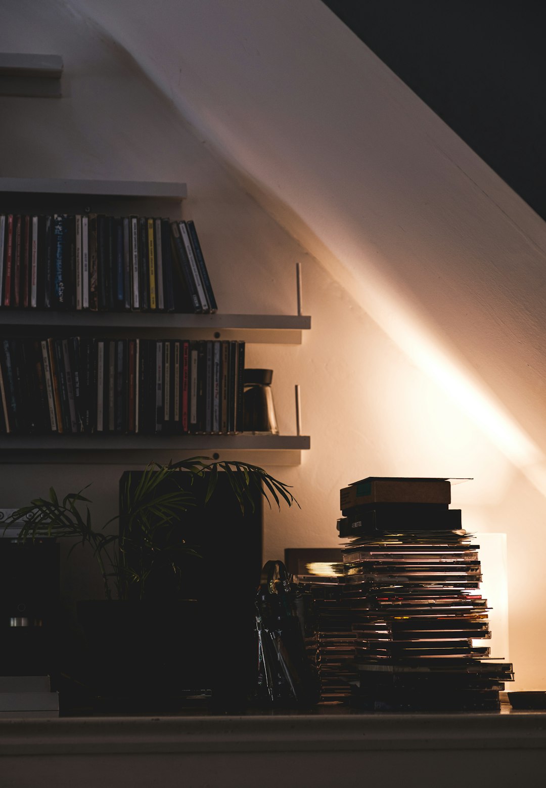 books on black wooden shelf