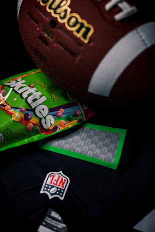 Detailed shot of a classic miniature football jersey with delicate stitching.