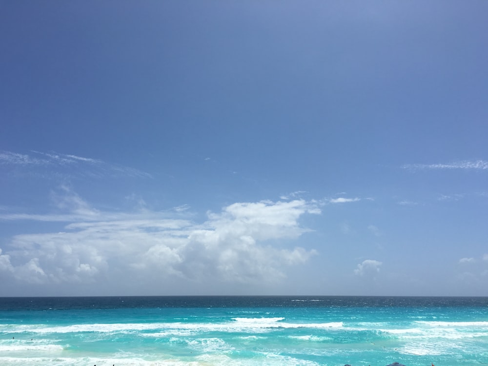 blue sky and white clouds over the sea