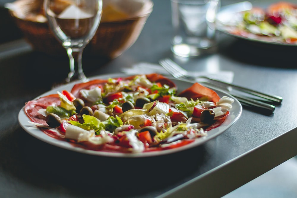 vegetable salad on white ceramic plate