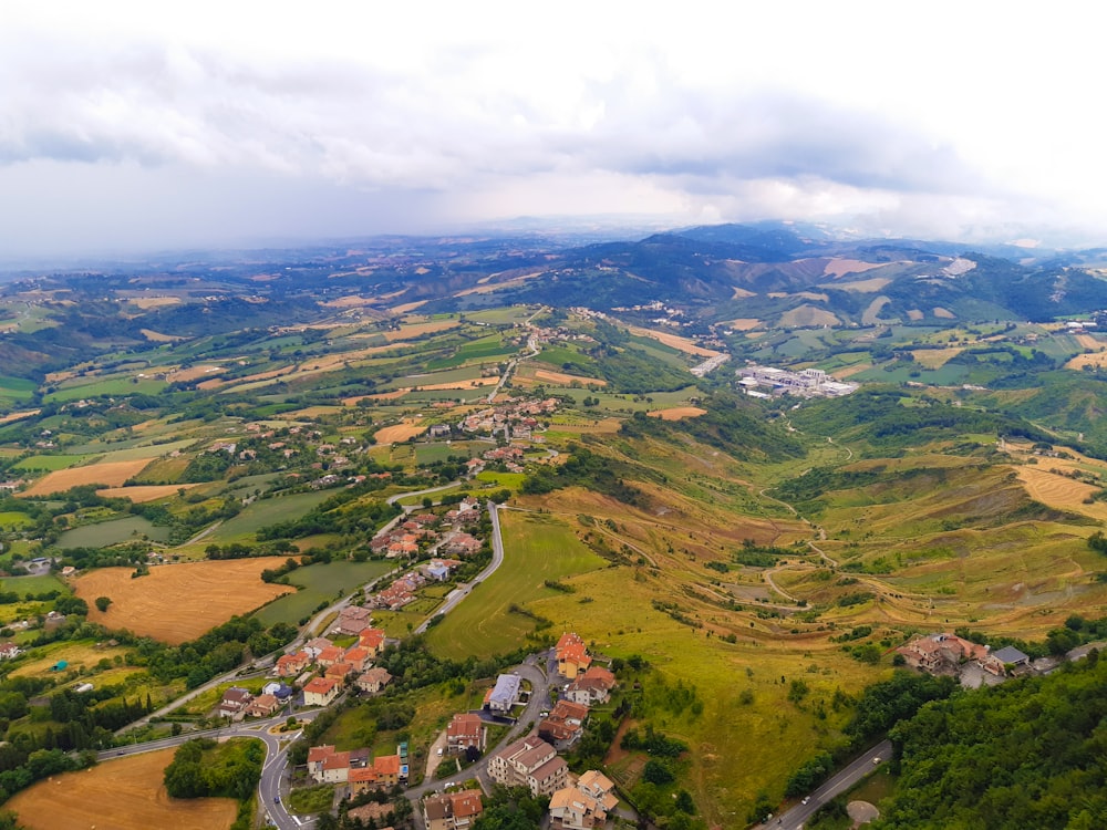 aerial view of green and brown mountains during daytime