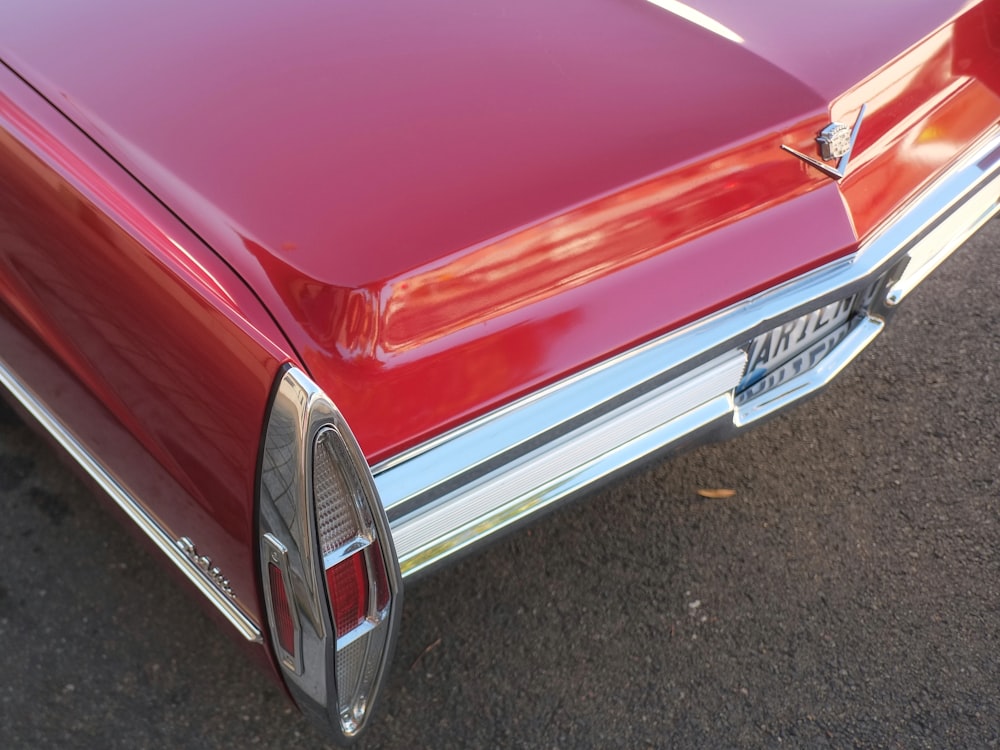 red car on gray asphalt road