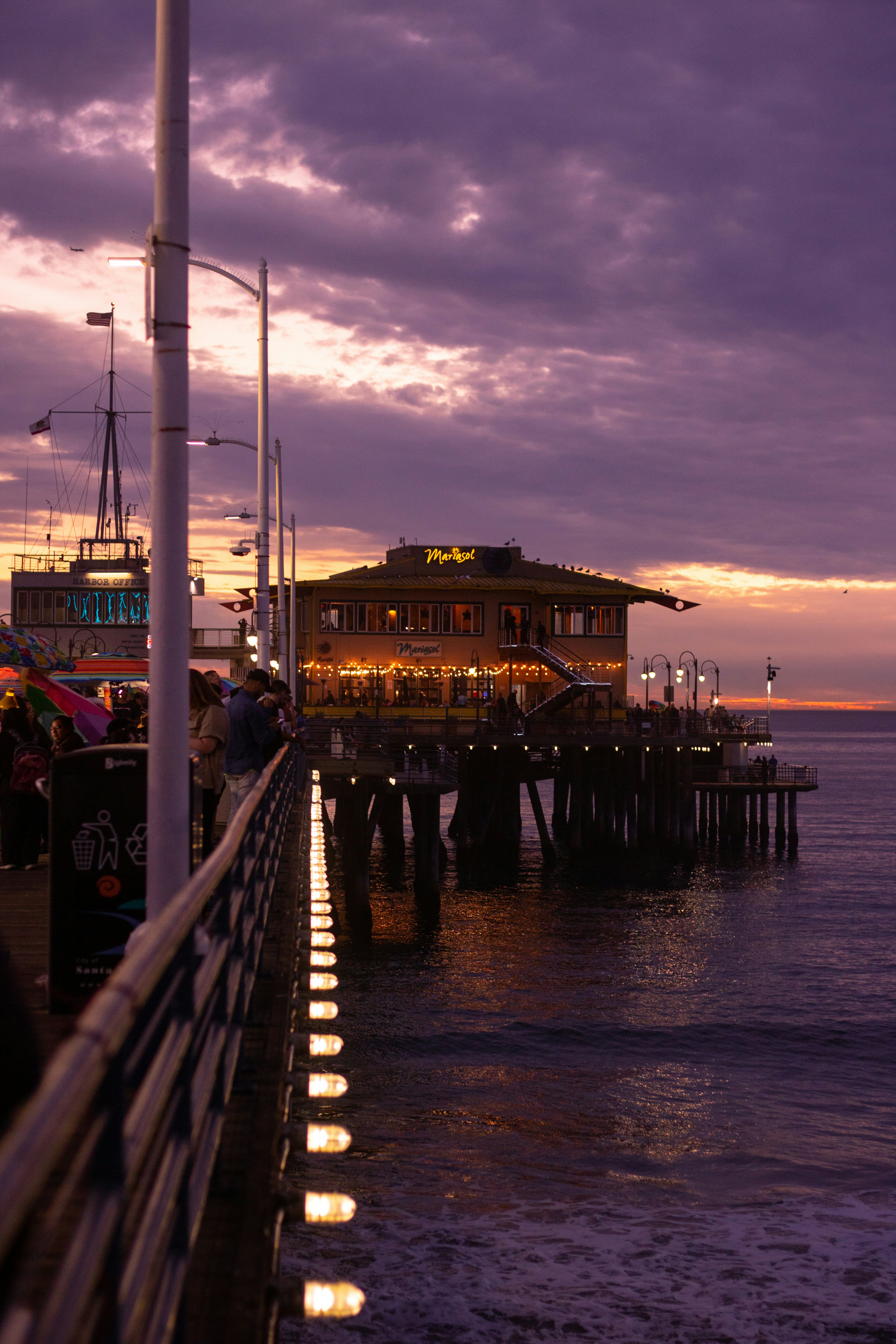 people walking on dock during daytime