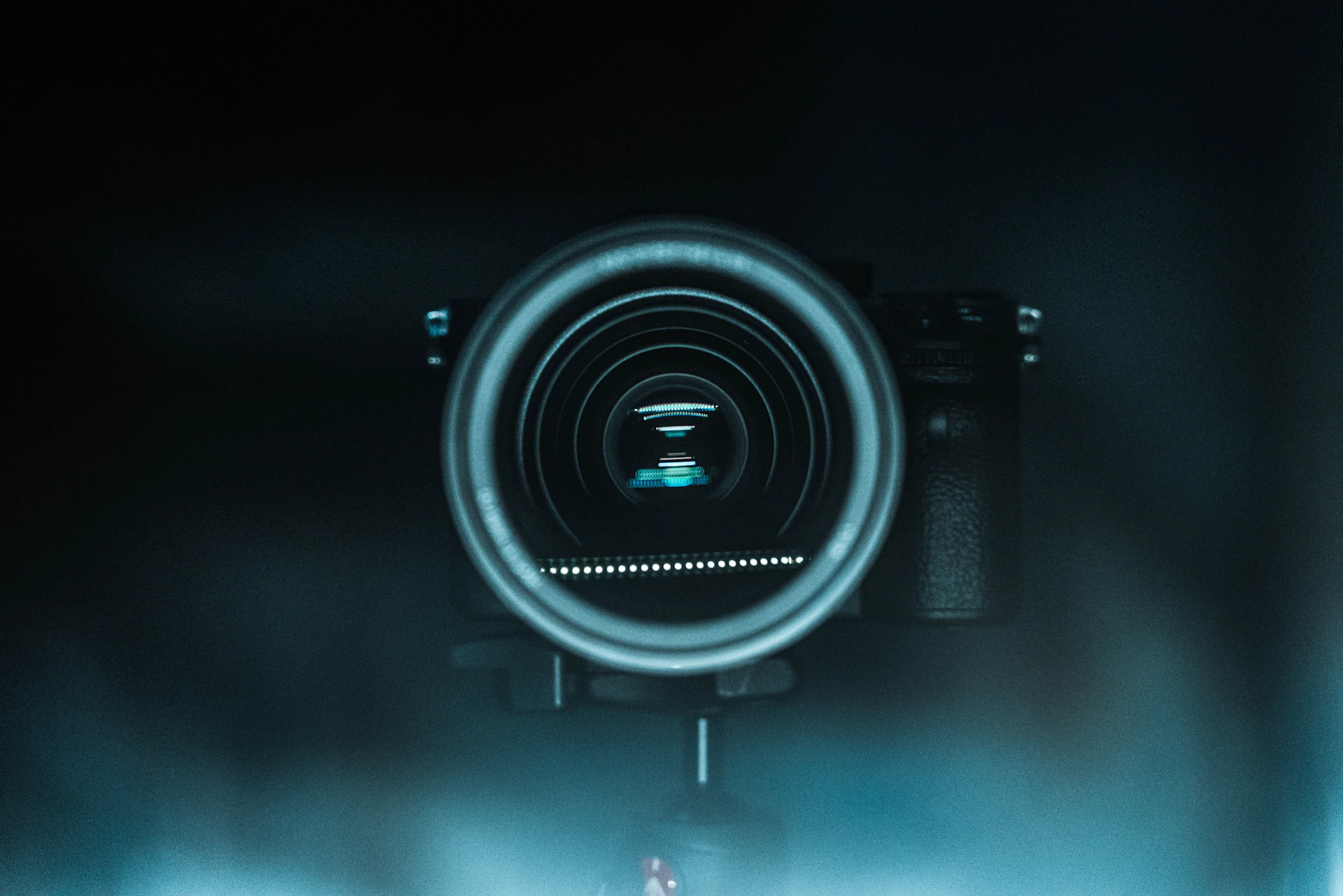 black camera on white surface