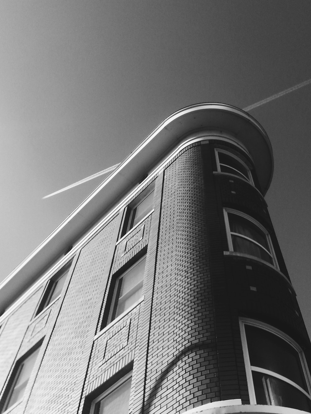 grayscale photo of concrete building