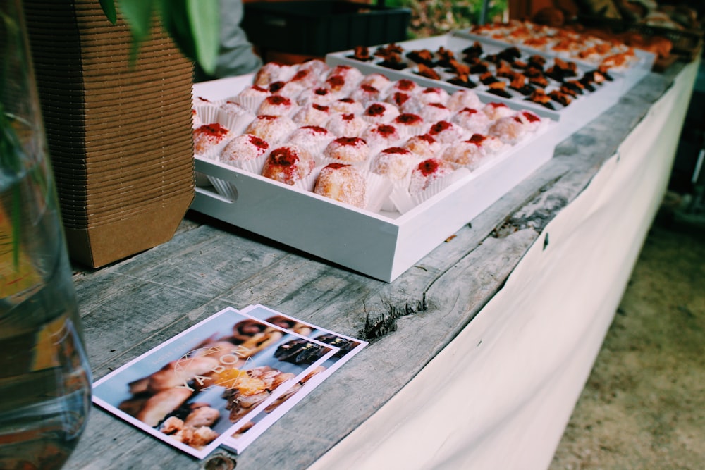 white and red cake on white tray