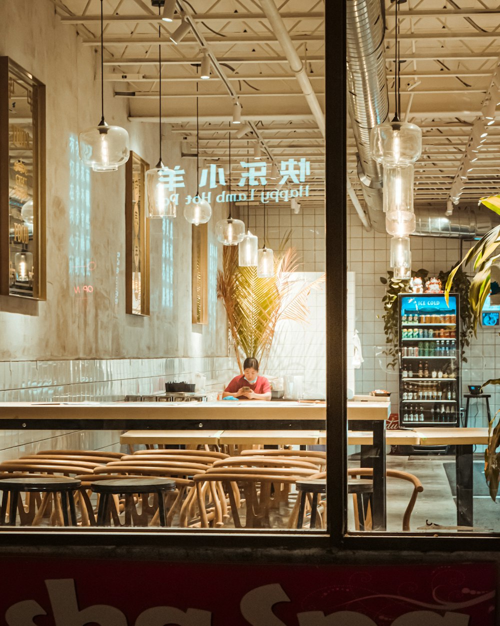 brown wooden bar counter with brown wooden stools