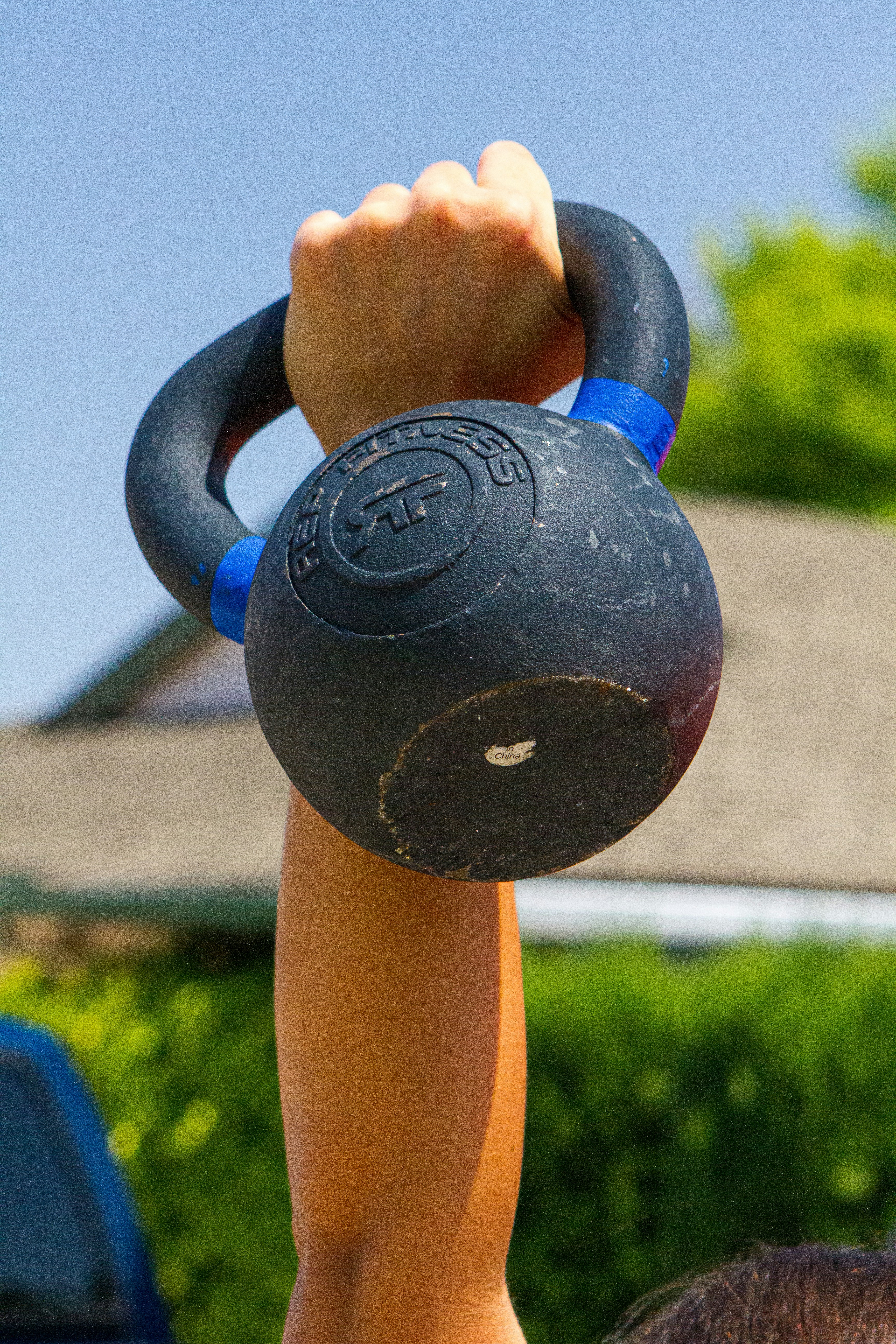 Image of a person lifting weights