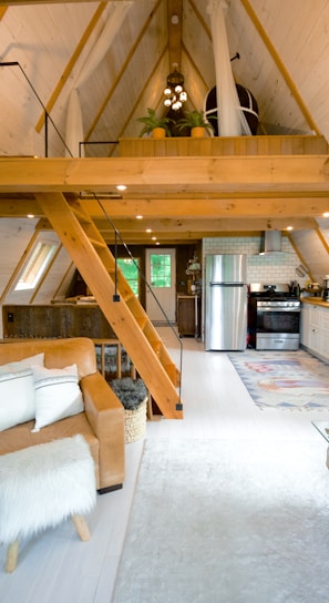 white couch beside brown wooden table